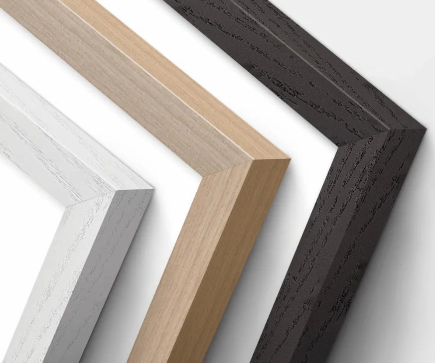 Gallery frames in three finishes: white, natural wood, and black